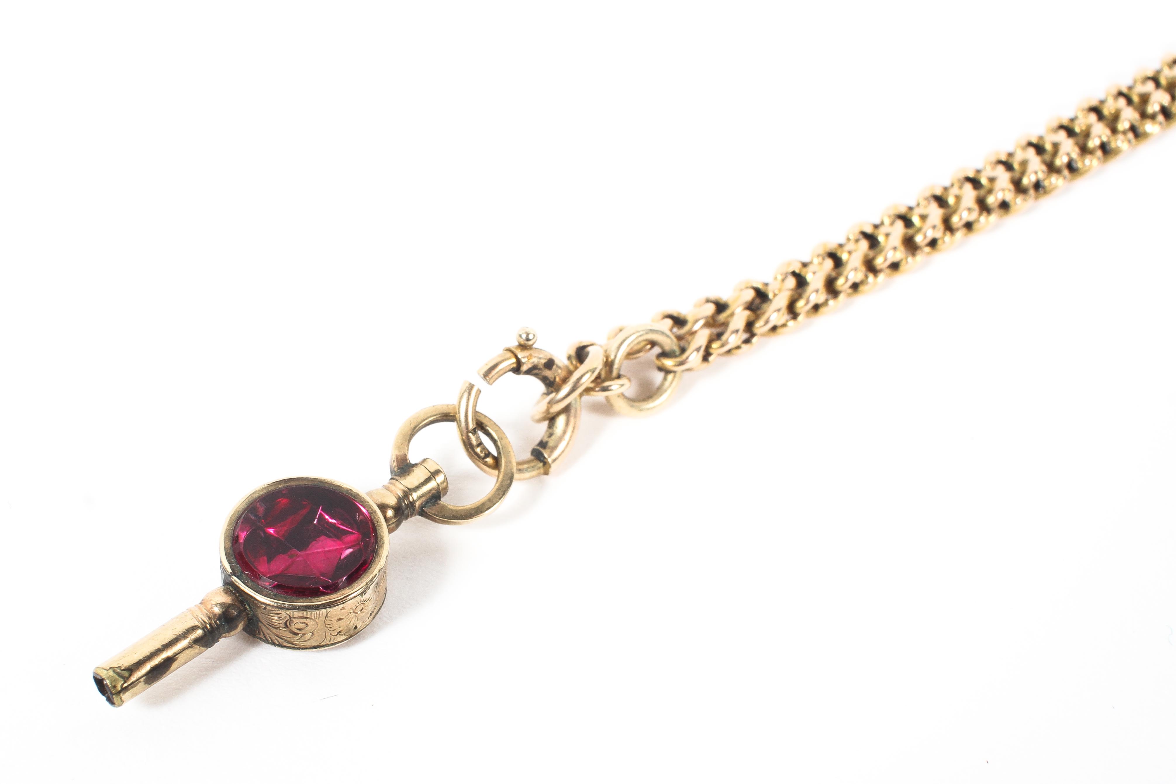 A 9ct gold chain link necklace with watch key fob . Length 80cm. approx 21g. - Image 2 of 2