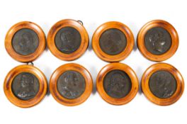 Eight bronzed stoneware framed portrait medallions, early 19th century,