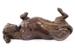 A Doris Linder 'Heredities' model of a daschund in bronzed resin, signed to base,
