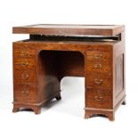 An Edwardian mahogany wash stand, 19th century, with hinged top,