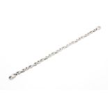 A 9ct white gold flat fancy link bracelet. 8.5g.