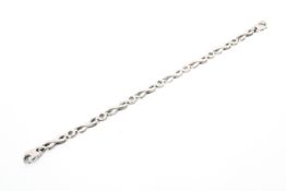 A 9ct white gold flat fancy link bracelet. 8.5g.