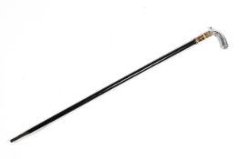 A snakeskin and white metal mounted walking cane sword stick , on ebonised cane,