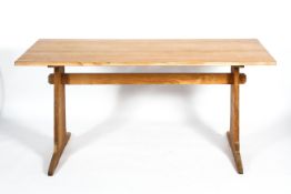 An oak refectory dining table, on two pedestal supports, early 20th century,