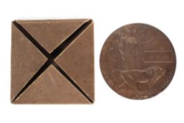 A World War I death penny in original folding brown card envelope, the named for ROY PHILLIPS,