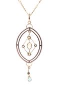 A 9ct gold and opal set open work pendant on a 9ct marked chain link necklace,