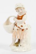 A Berlin-style porcelain spill-vase figure of a girl, late 19th century with spurious KPM marks,