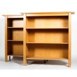 A pair of bookcases, 20th century, perhaps yew wood, each with adjustable shelves,