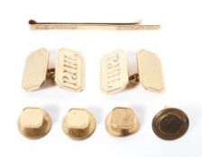 A pair of 9ct gold double cufflinks together with a 9ct tie pin and studs. 13.5g.