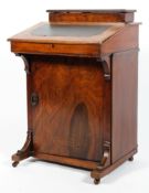 A Victorian walnut small writing desk, inlaid with satinwood scrollwork,