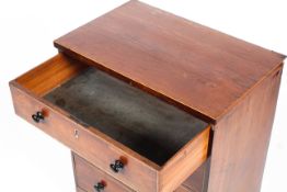 An early 19th century mahogany small chest of drawers, inlaid with statinwood strining,