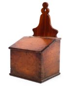 An early 19th century mahogany candle box,