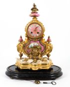 A French Sevres-style pink-ground gilt-metal mounted striking mantle clock, late 19th century,