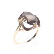 A 9ct gold smokey quartz set ladies dress ring. Size P, 2.8g.