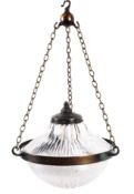 An Edwardian pendant light, with domed press-moulded shade and copper fittings,