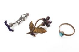 An enamel Mercury brooch, an unmarked flower brooch and a turquoise set ring.