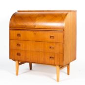 A mid-century Egon Ostergaard teak roll top bureau,