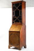 A Georgian mahogany bureau bookcase with glazed astragals, enclosing two shelves and two drawers,