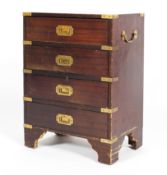 A mahogany and brass bound four drawer campaign chest with brass side handles, 20th century,