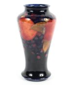 A Moorcroft baluster pomegranate pattern vase, 20th century, printed and impressed marks in green,