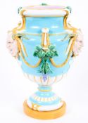 A Minton majolica urn-shaped vase, circa 1870, impressed marks, moulded with satyr masks,