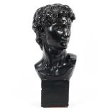 A large plaster portrait bust of David, 20th century, painted in black, incised 983 to reverse,
