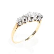 An 18ct gold five stone diamond ring, size N, 3.0g.