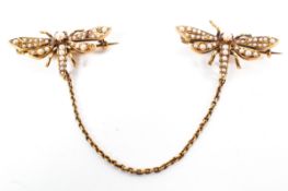 A 9ct gold and seed pearl double chain brooch each modelled as a dragonfly. 5.8g.
