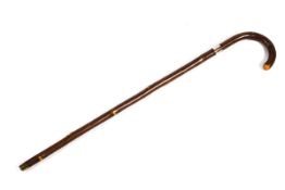 A Victorian walking cane,sword stick with etched blade marked wilkinson Sword.