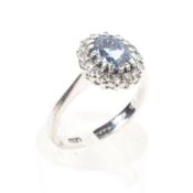 An 18ct white gold sapphire and diamond dress ring, Size J, 1.2g.