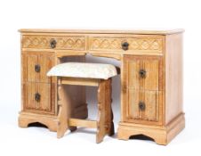 A carved limed oak part bedroom suite, 20th century,