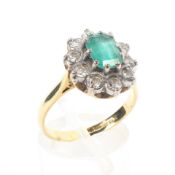 An 18ct gold and emerald and diamond set dress ring, Size O, 4.9g.