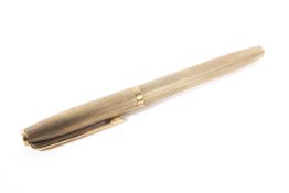 A 9ct gold cased pen with engine turned decoration, Continental import marks stamped MW, 19g.