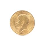 A George V gold sovereign dated 1912, 7.9g.