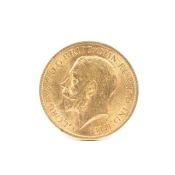 A George V gold sovereign dated 1912, 7.9g.