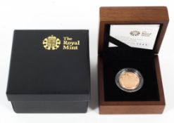 A 2009 shield of the Royal arms, 22ct gold £1 gold proof coin,