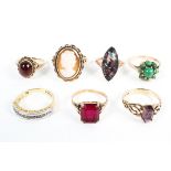 A collection of seven 9ct gold gem set ladies rings. Various sizes. 18g.