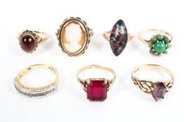 A collection of seven 9ct gold gem set ladies rings. Various sizes. 18g.