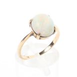 A 9ct gold and opal ring set with single oval cabochon cut opal 1.9g. Size L.