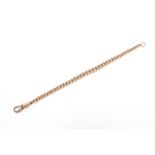 A 9ct rose gold curb link bracelet with lobster clasp.