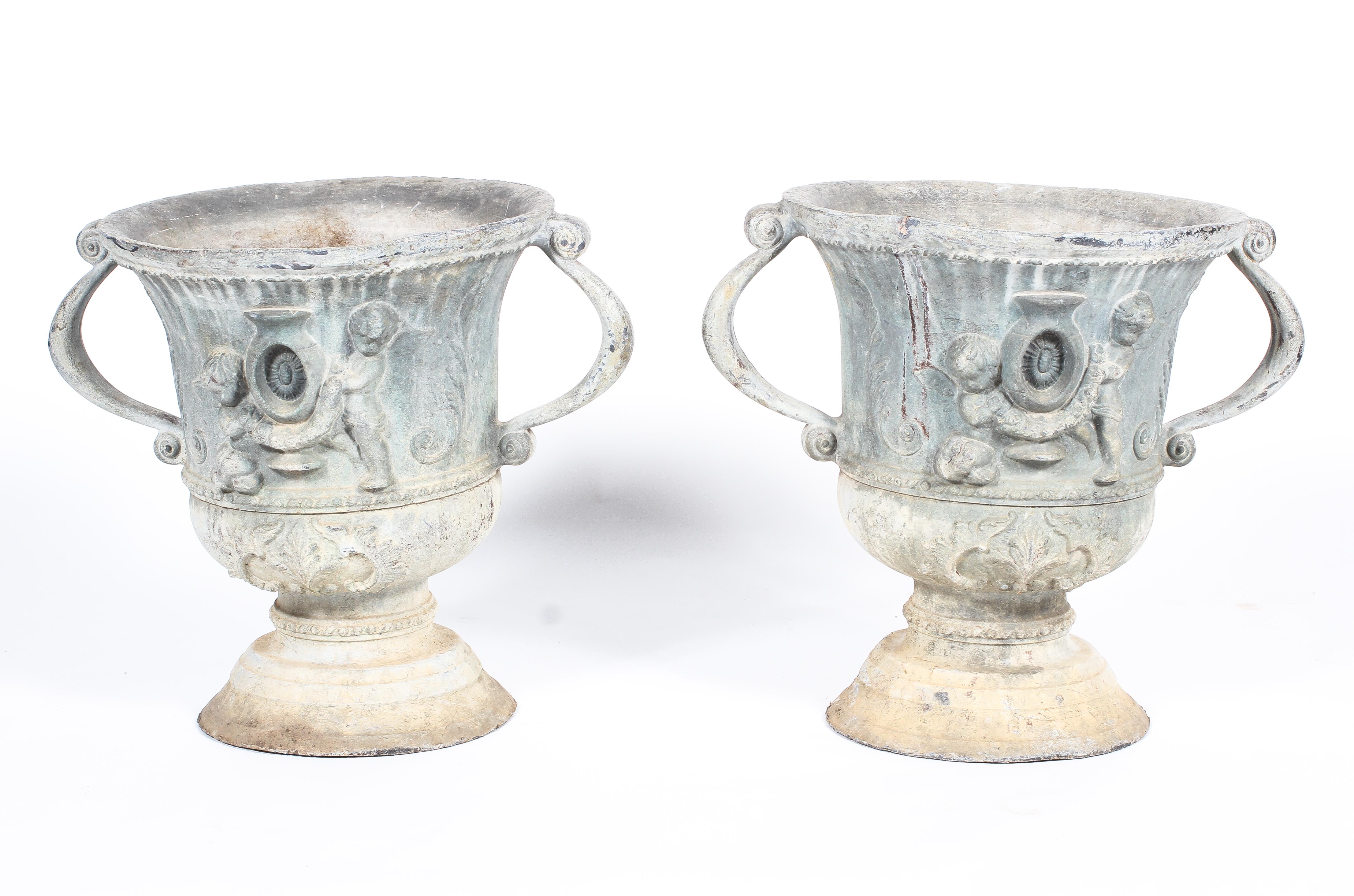 A pair of lead garden camana-shaped two-handled urns, late 19th/early 20th century,