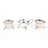 A three piece condiment set, two open salts and a lidded, single handled mustard,