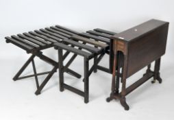 A Victorian rosewood sutherland table together with two folding luggage stands
