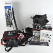 Large selection of cameras and photographic equipment to include bags tripods and other items.