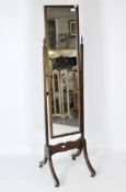 An early 20th century mahogany cheval swing mirror,