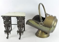 A Victorian brass footman trivet, together with a coal scuttle