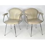 Two Retro hairdresser armchairs chairs, raised on chrome legs,
