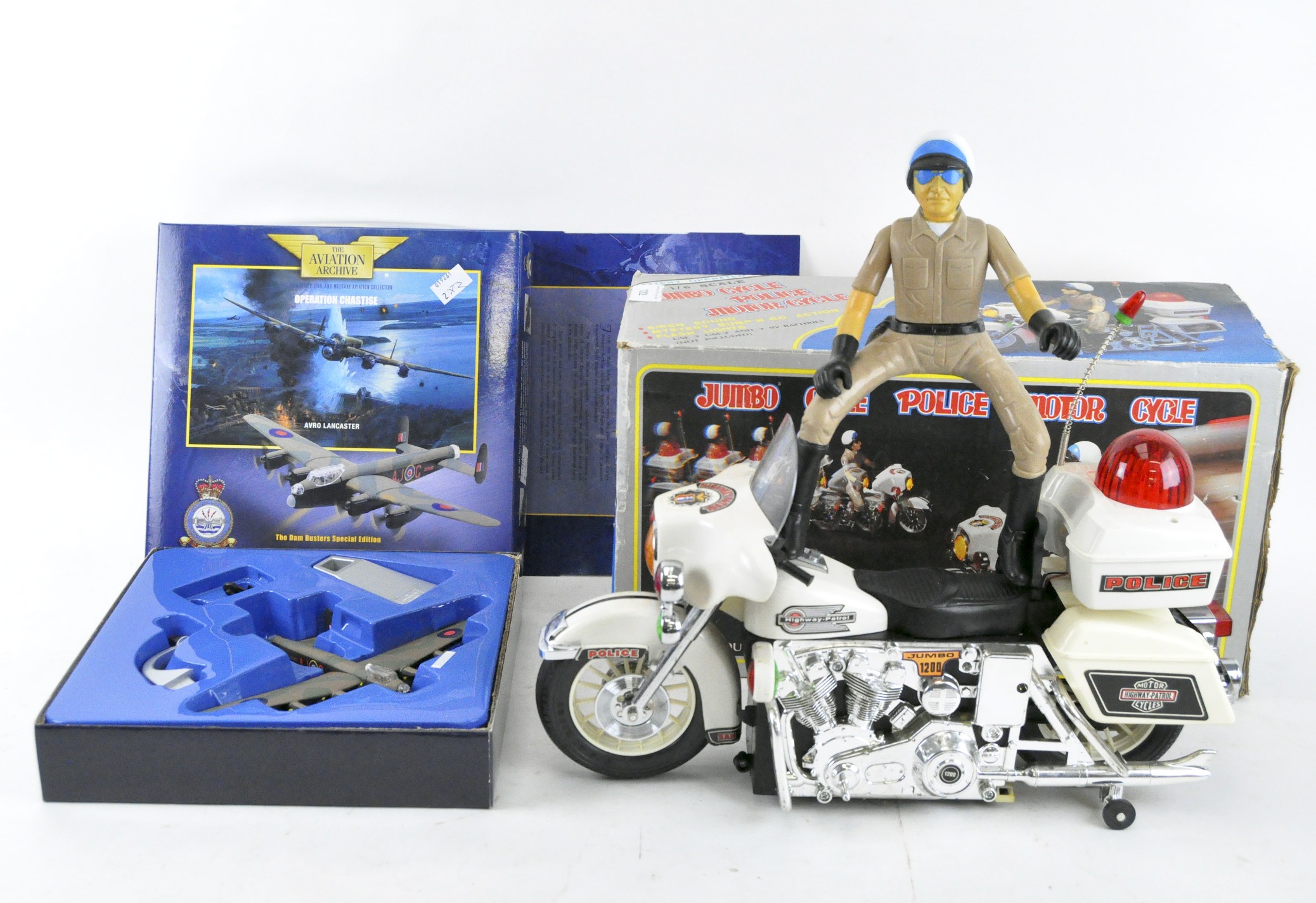 A Corgi Aviation Archive 'Lancaster Bomber' and a vintage Jumbo Cycle Police bike,