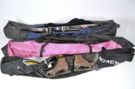 Three ski bags containing First, Fischer,