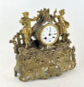 A late 19th-early 20th Century mantel clock,